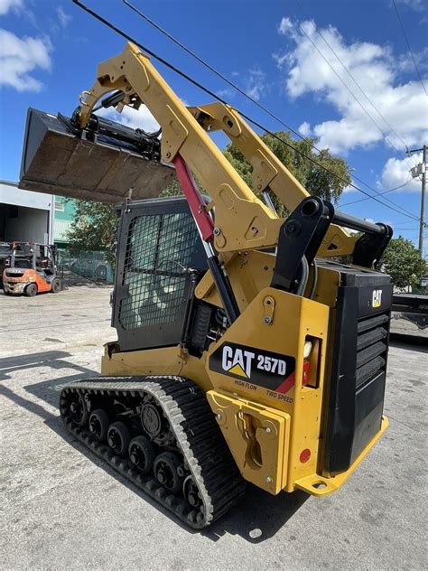 caterpillar 257d skid steer price